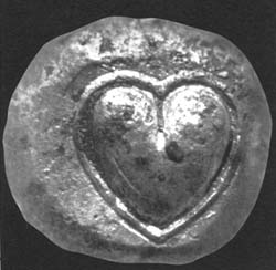 Moneta przedstawiajca nasienie sylfionu w ksztacie serca/ rdo: Wikipedia